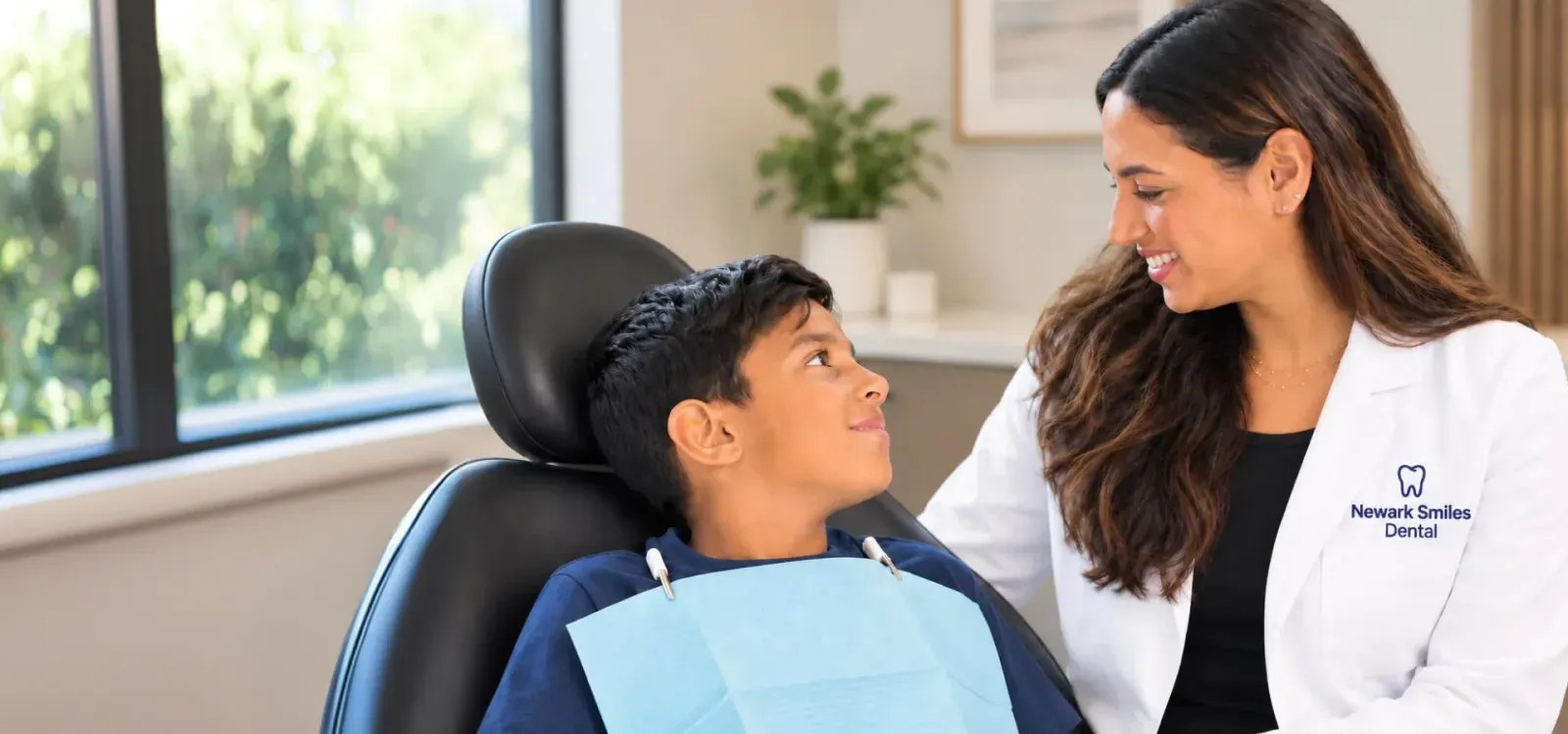 Patient smiling in the Newark Smiles Dental office