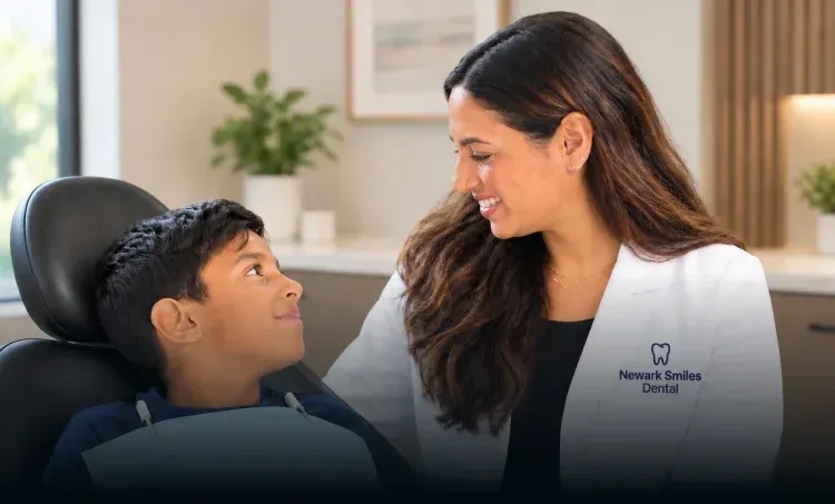 Patient smiling in the Newark Smiles Dental office
